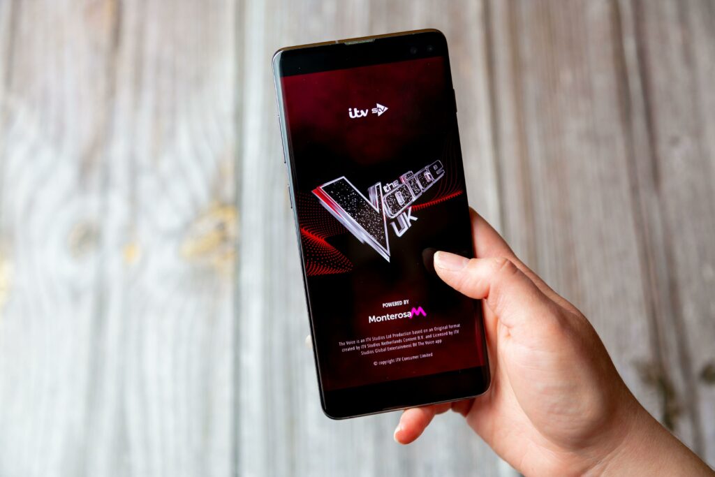 Picture of The Voice App on a mobile screen as The Voice UK is mentioned as an asset in metadata that can cause issues with viewing experiences.